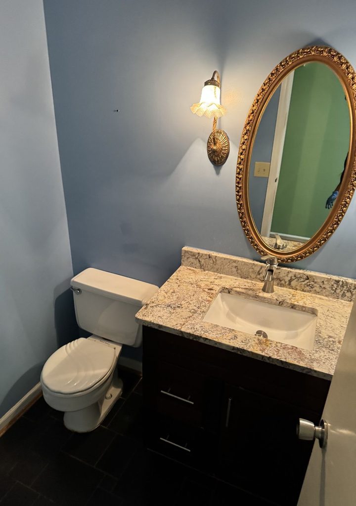 Half bath, granite vanity